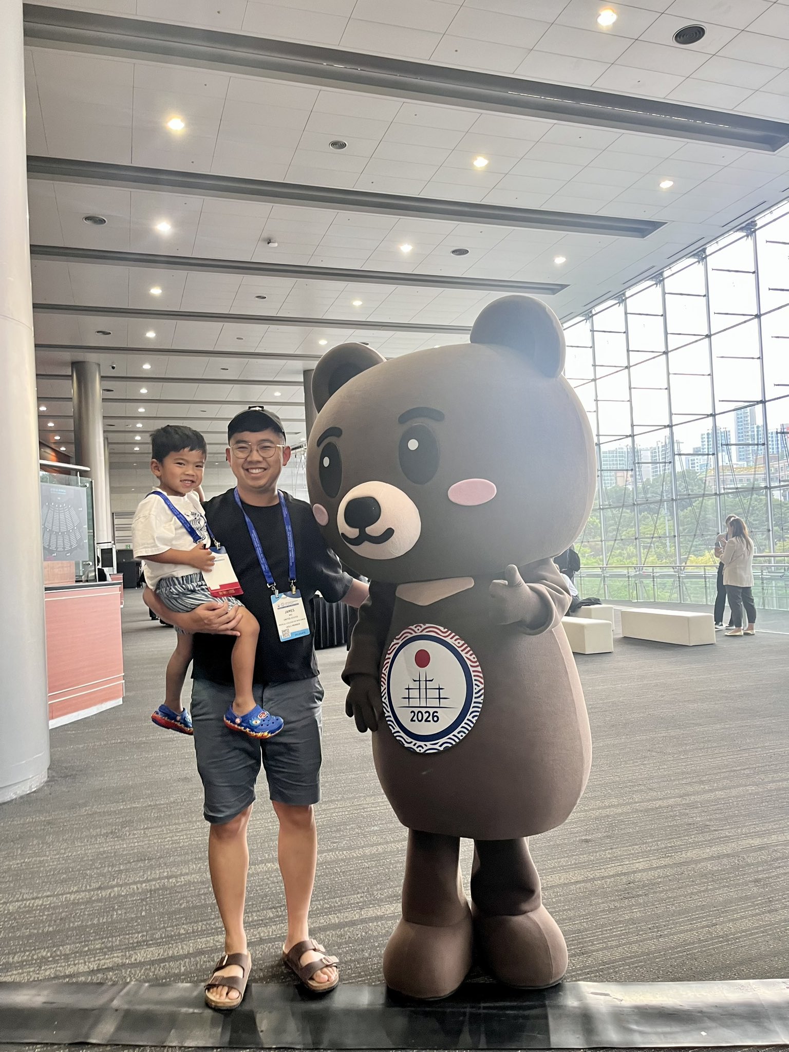 My son requested his own badge and a picture with the @IASLC #WCLC26 mascot! Wishes grante