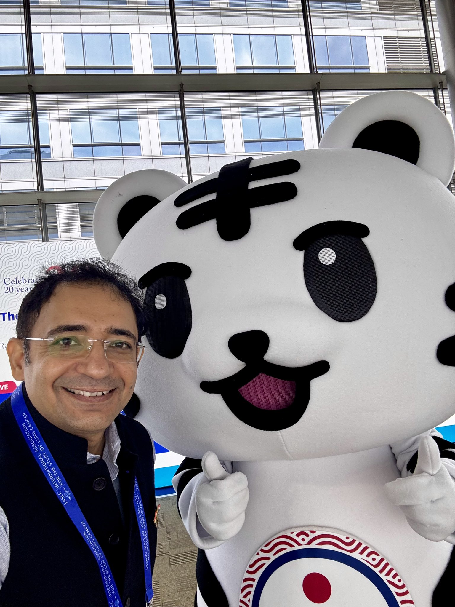 Smile competition with the #WCLC26 Mascot… I think we both came prepared! 😄🐼 https://t.co